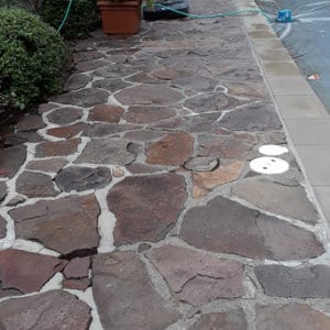 Pool side stone after pressure washer